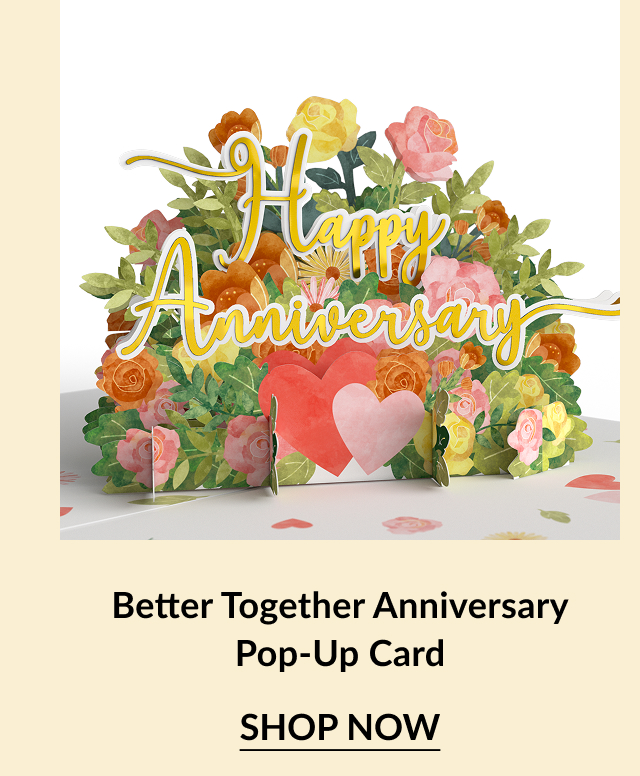Colorful pop-up card with ''Happy Anniversary'' text surrounded by flowers and hearts, promoting a special occasion.