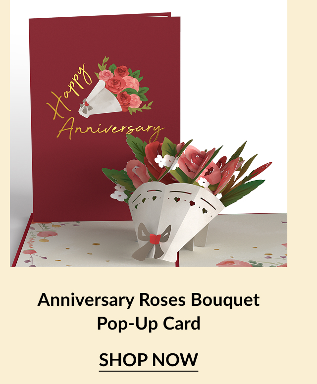 A pop-up card featuring a colorful bouquet of roses and flowers, with ''Happy Anniversary'' elegantly written on the front.