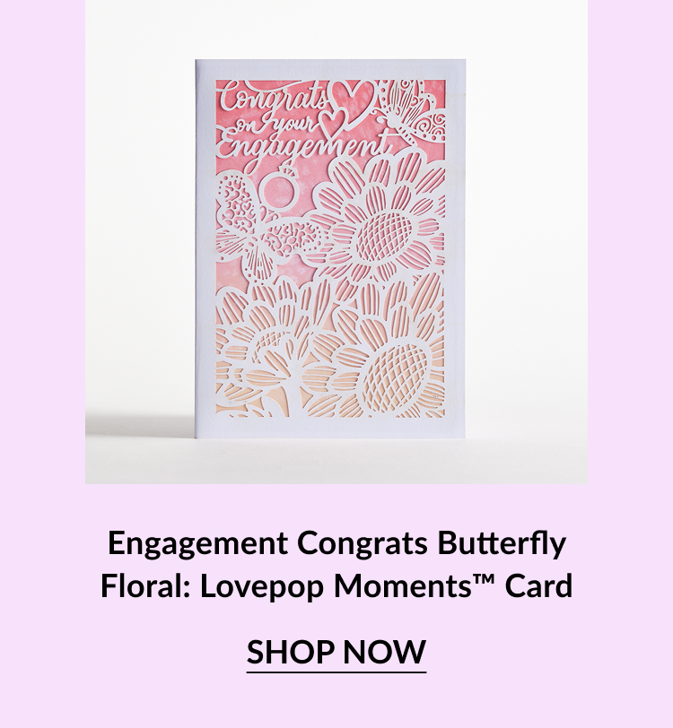 A delicate card with a floral and butterfly design, featuring the message ''Congrats on Your Engagement'' in elegant lettering.