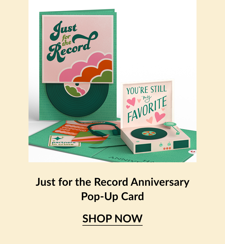 Colorful pop-up card featuring a vinyl record design with heartfelt messages, perfect for celebrating anniversaries.