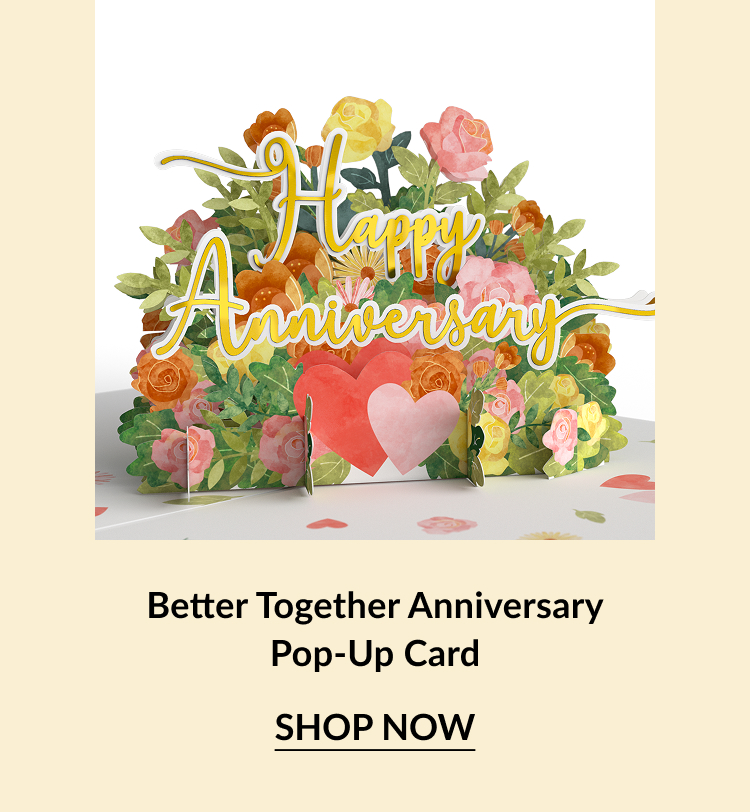 Colorful pop-up card with ''Happy Anniversary'' text surrounded by flowers and hearts, promoting a special occasion.