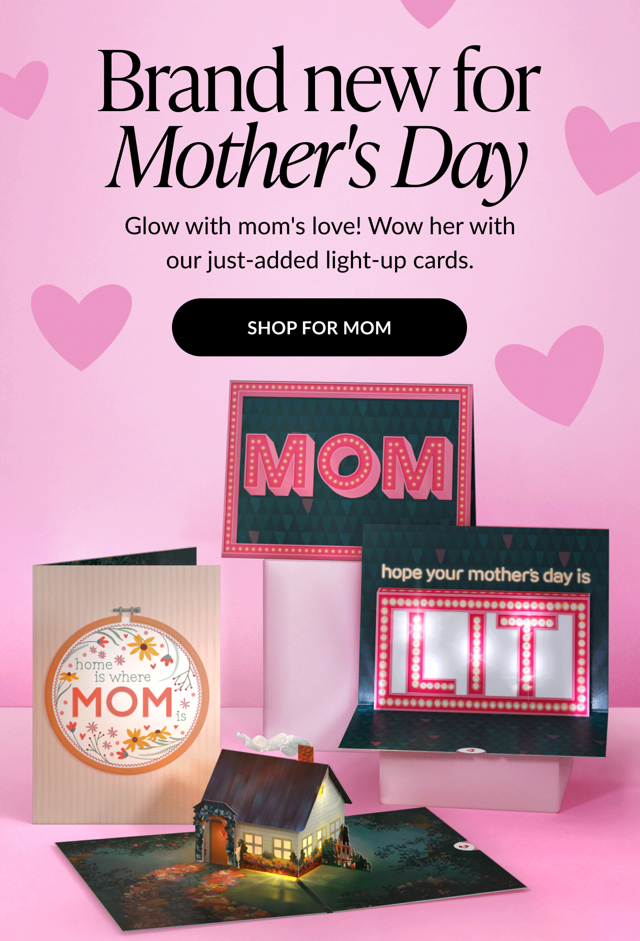 Colorful Mother's Day cards featuring light-up designs, set against a pink background with hearts and a ''Shop for Mom'' button.