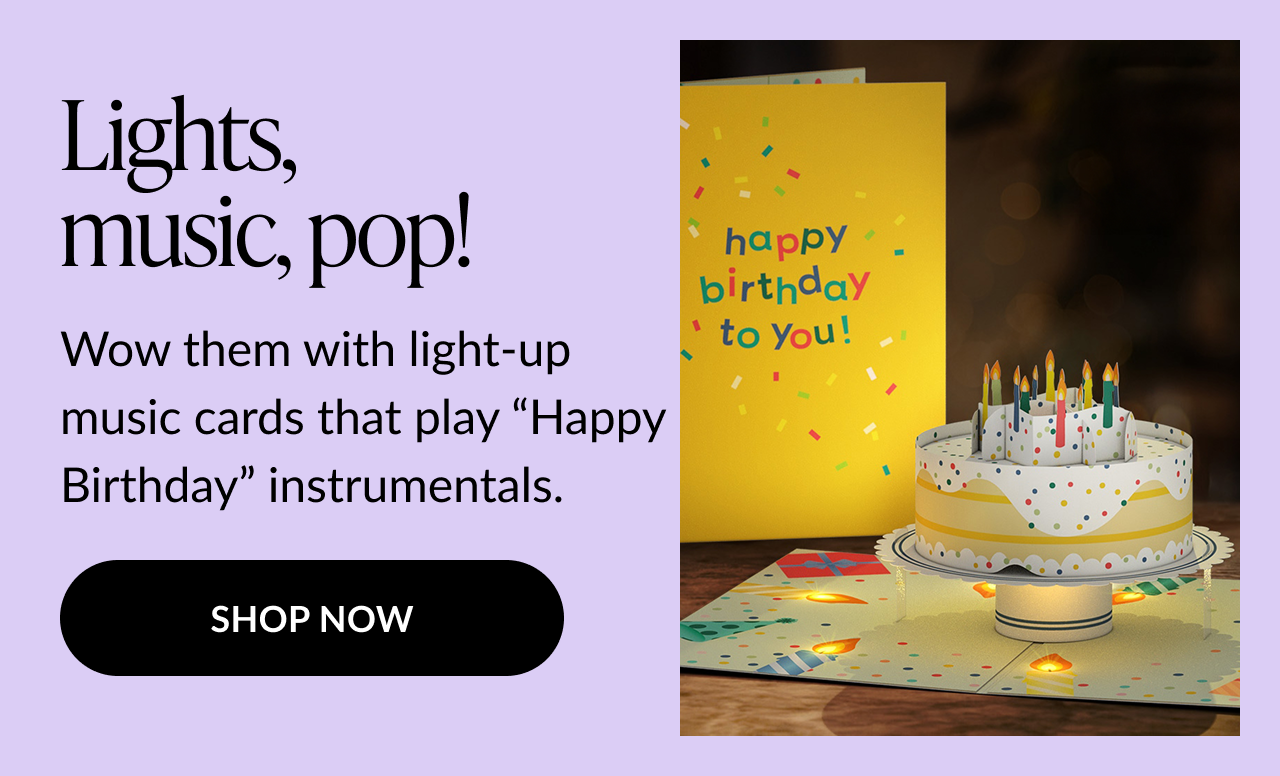 Product image showing a pop-up birthday card with a cake that has light-up candles and plays ''Happy Birthday'' music. Shop Now.