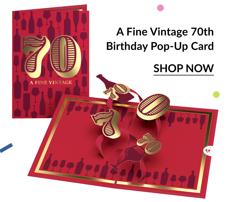 mage of a 70th birthday card featuring gold pop-up ''70'' numbers and wine bottle designs, with a ''Shop Now'' button.
