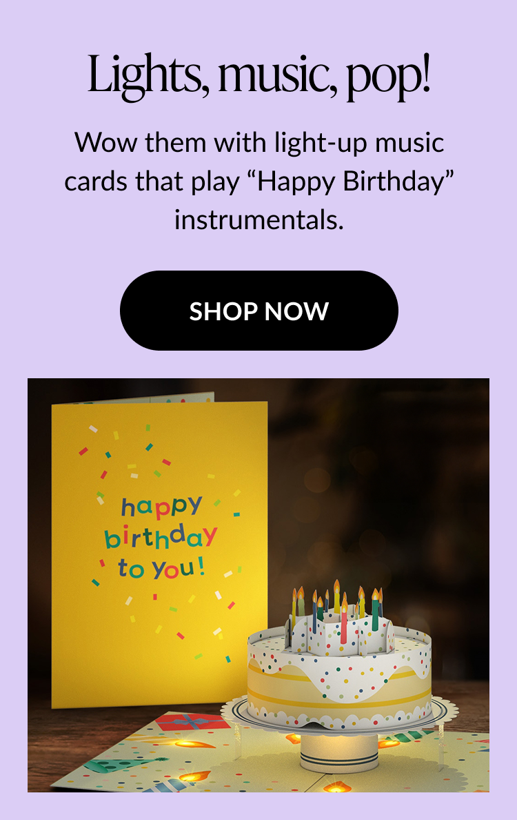 Product image showing a pop-up birthday card with a cake that has light-up candles and plays ''Happy Birthday'' music. Shop Now.