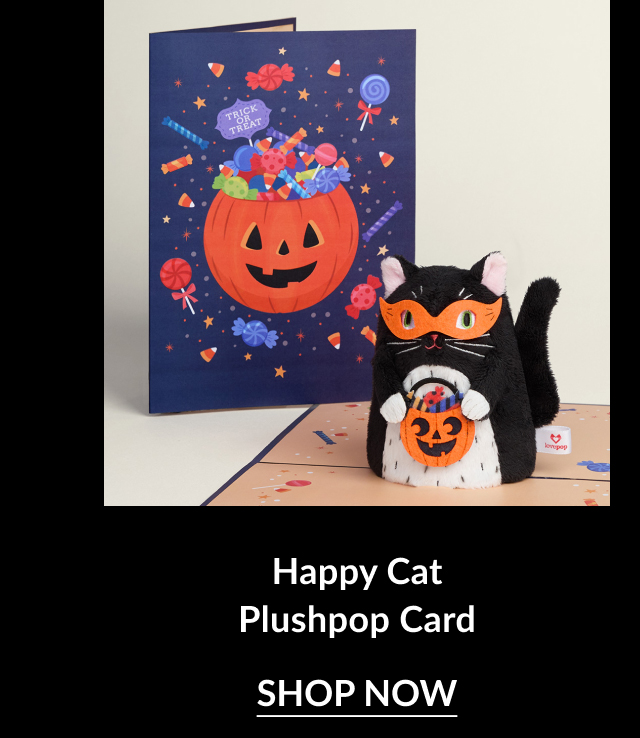 Halloween-themed pop-up card featuring a black cat with a jack-o-lantern and trick-or-treat candy in the background.