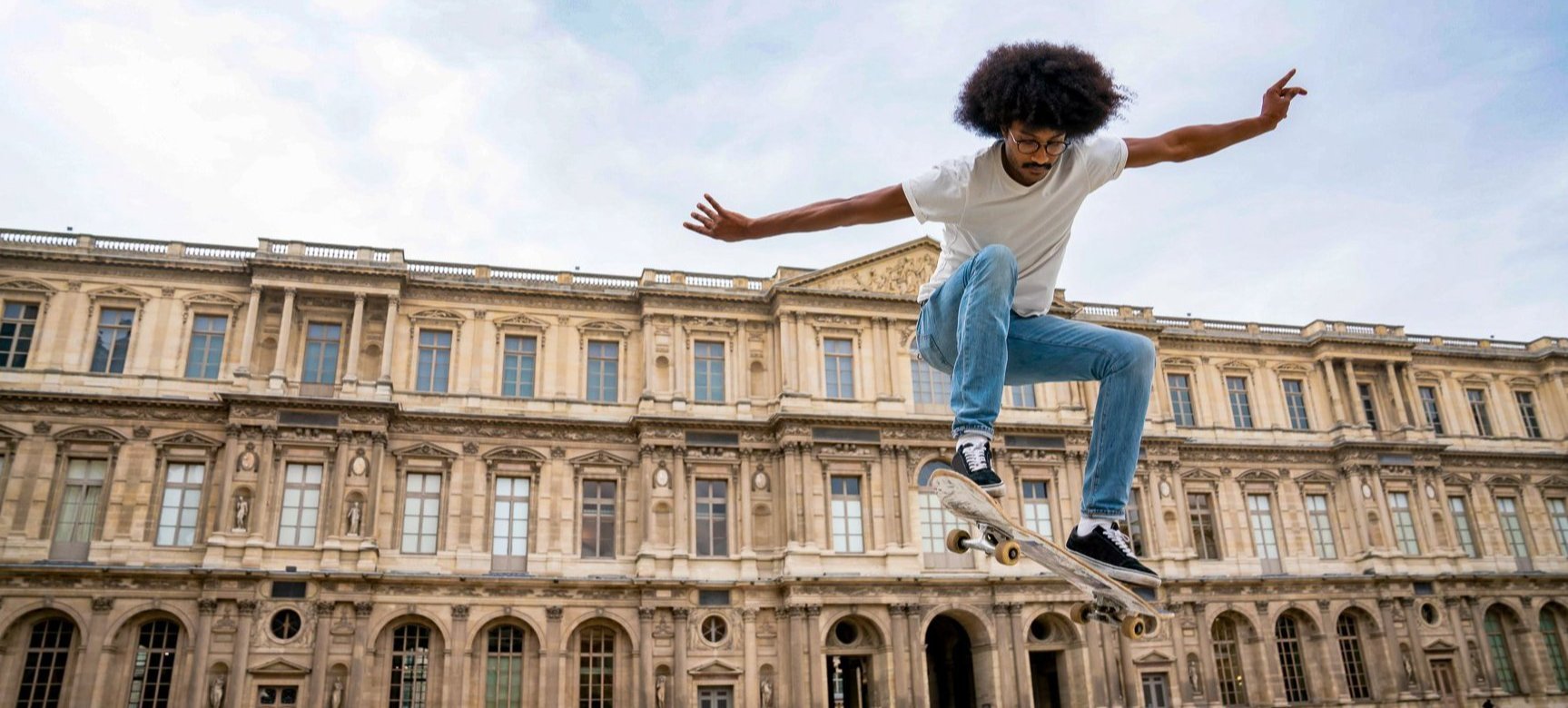 Guy Performing Trick With Skateboard