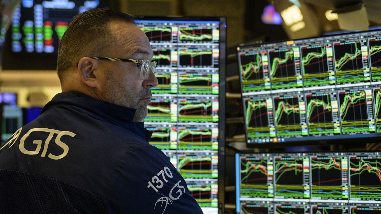 Traders work the floor of the New York Stock Exchange on July 25, 2023