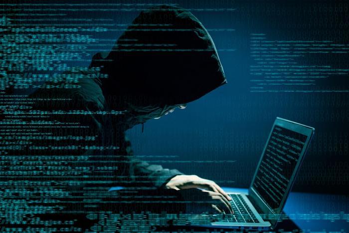 Hacker infront of computer