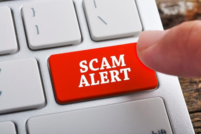 Button that says Scam Alert