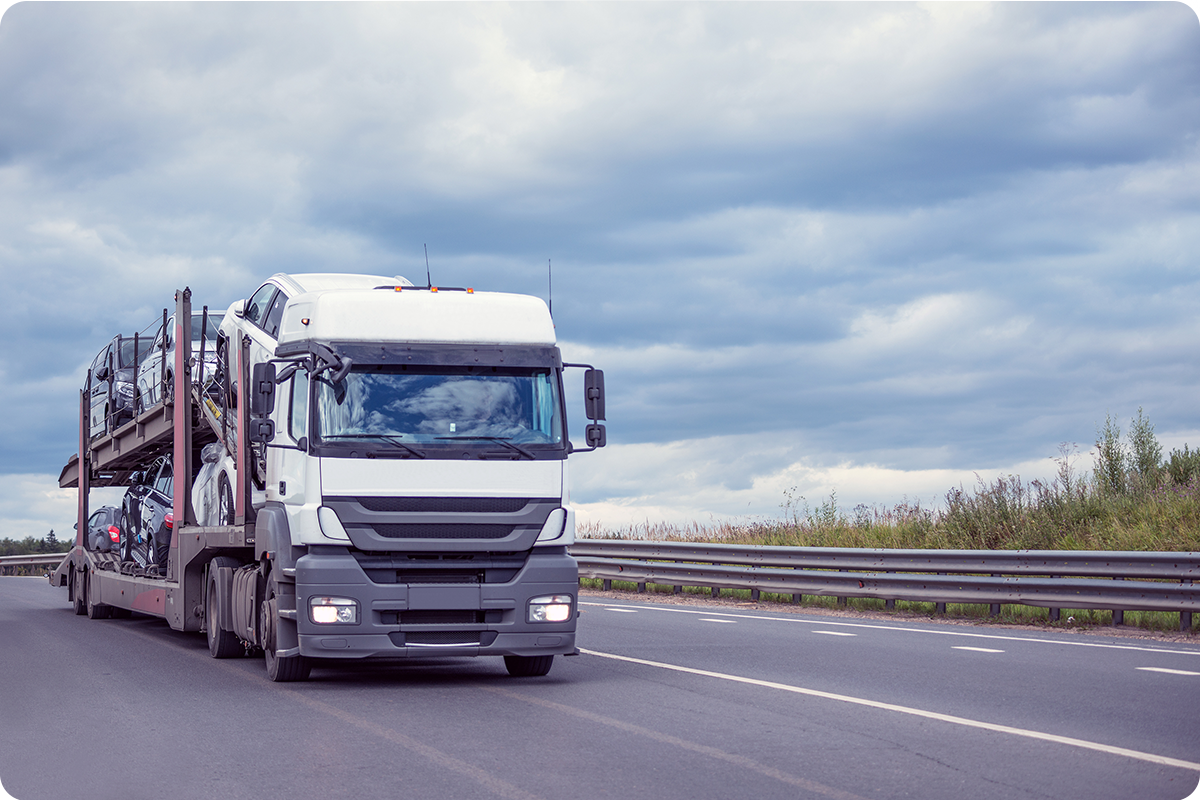 A truck transporting cars