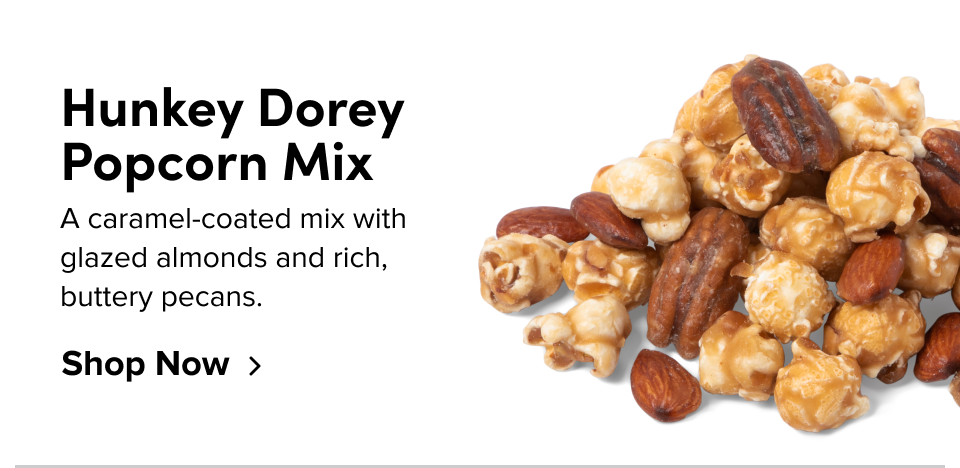 Hunkey Dorey Popcorn Mix A caramel-coated mix with glazed almonds and rich,  buttery pecans. Shop Now