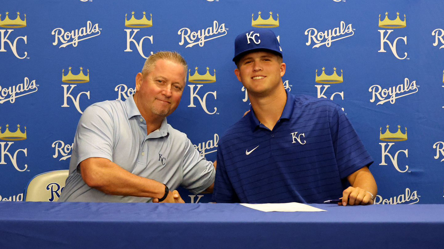 Drew Beam when he signed his contract with the Royals