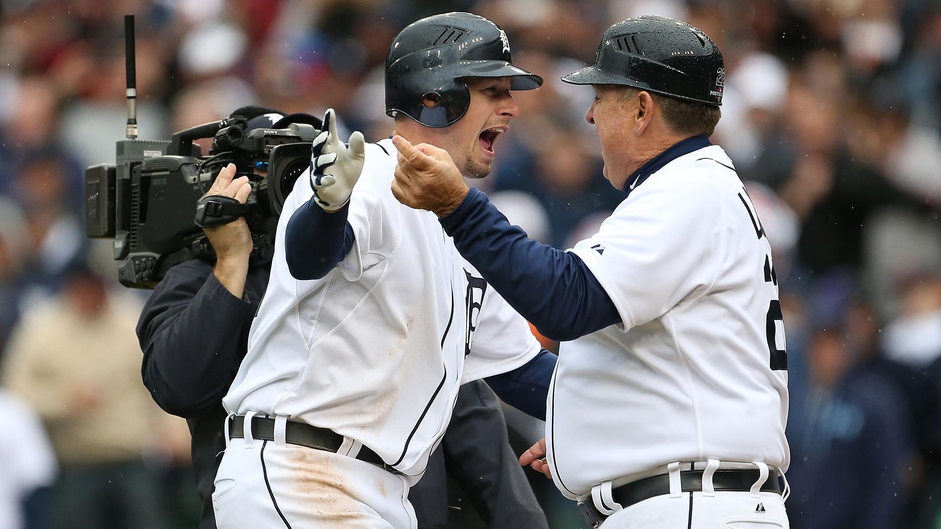Don Kelly and Gene Lamont celebrate Kelly's walk-off sac fly in Game 2 of the 2012 ALDS