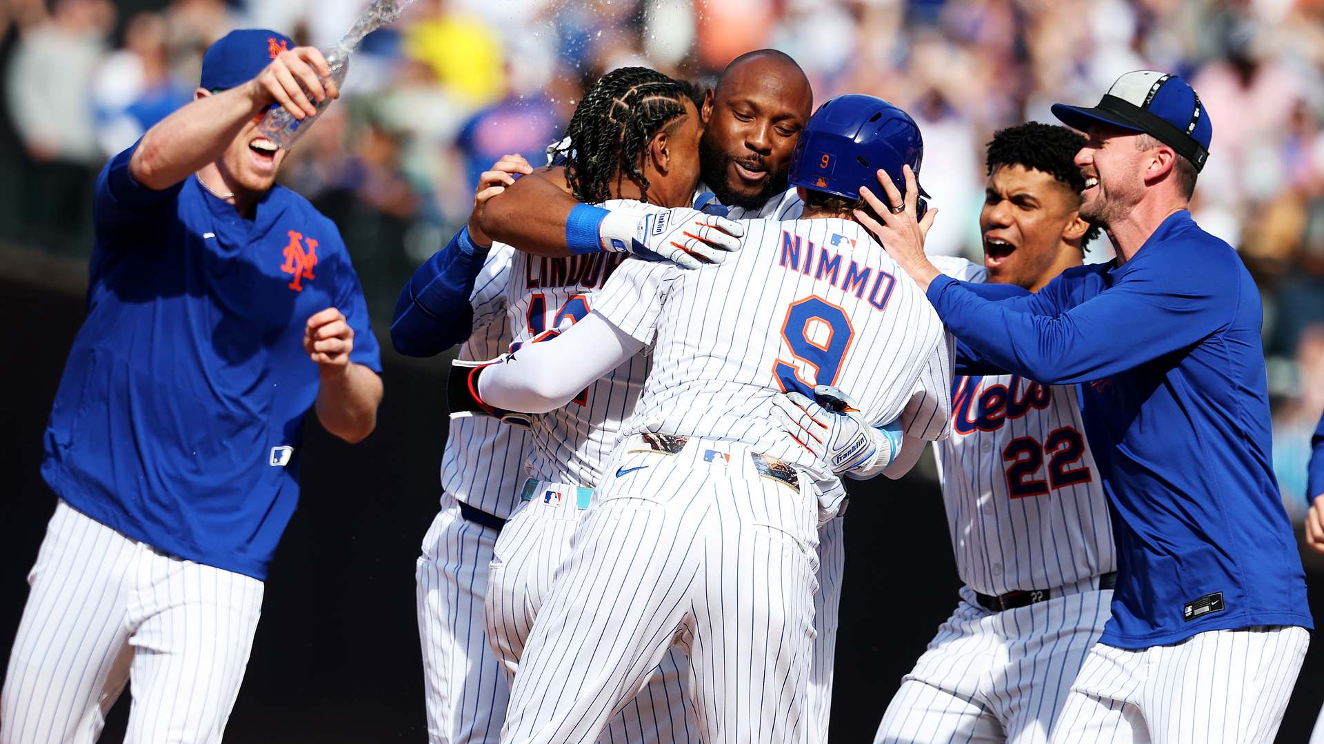 The Mets celebrate Starling Marte's walk-off single vs. the Phillies