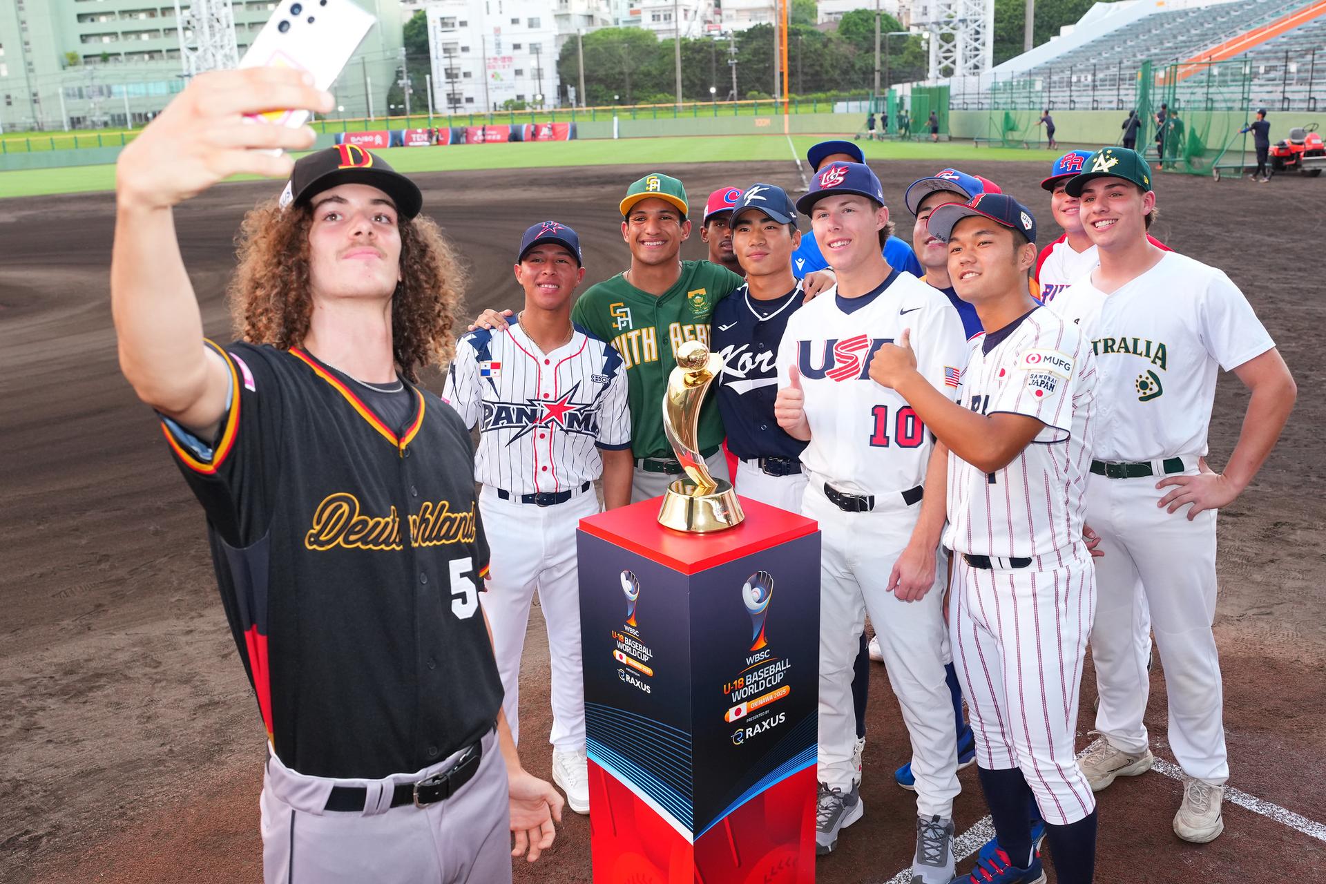 Players from all around the world pose for a photo. Grady Emerson, No. 10, is among the group.