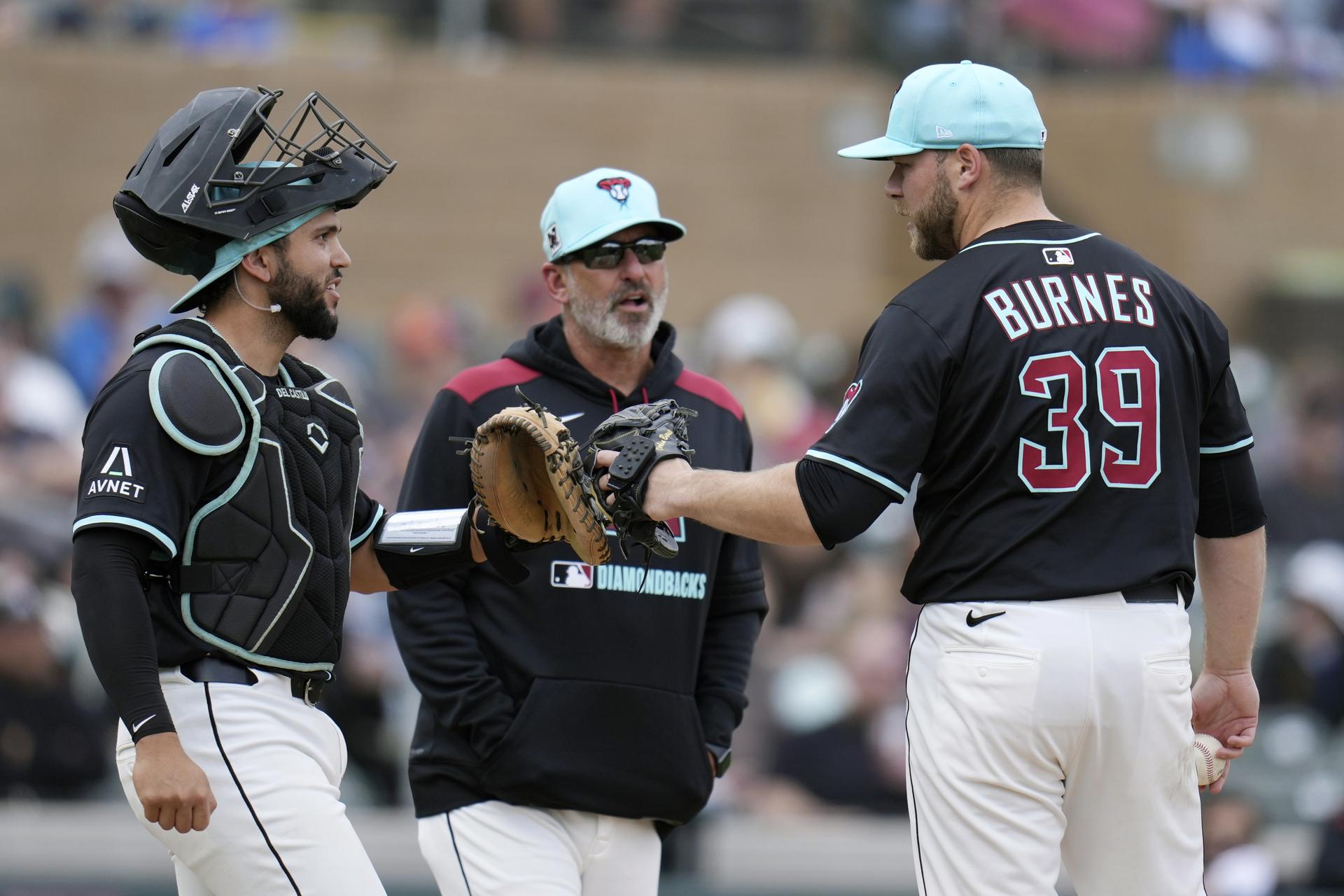 Adrian Del Castillio, Torey Lovullo and Corbin Burnes