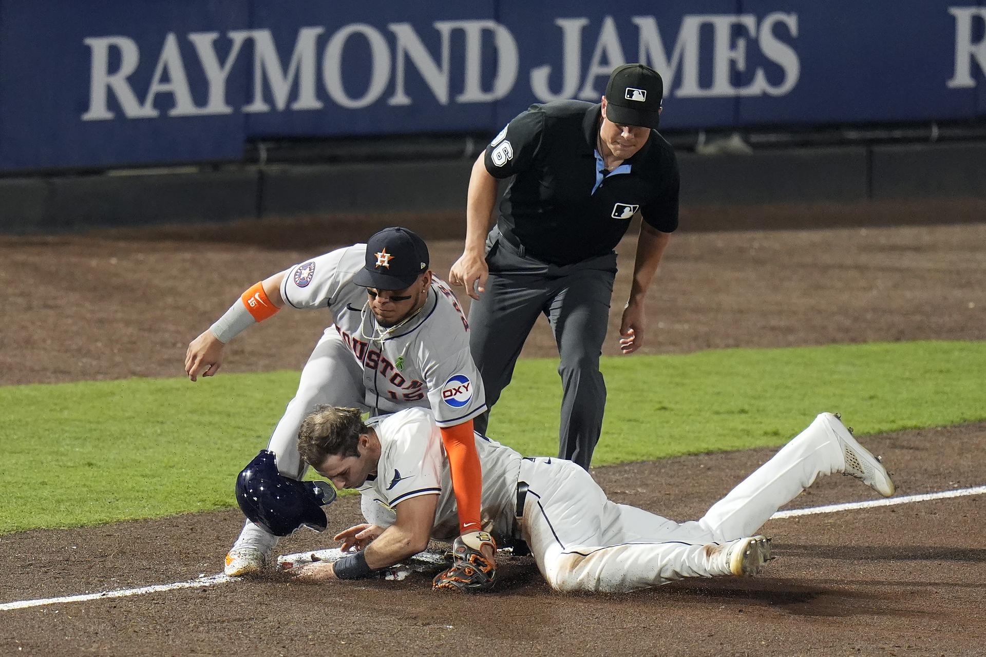 Kameron Misner steals third base