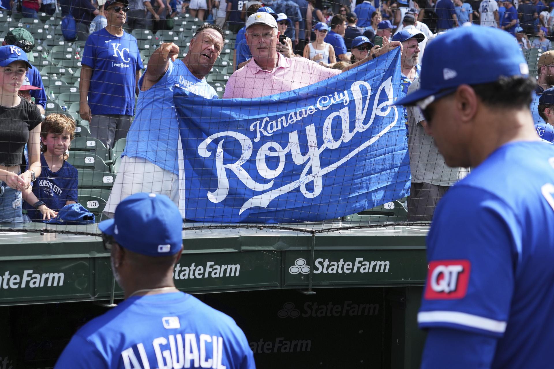 Fans with a Royals banner at Wrigley Field