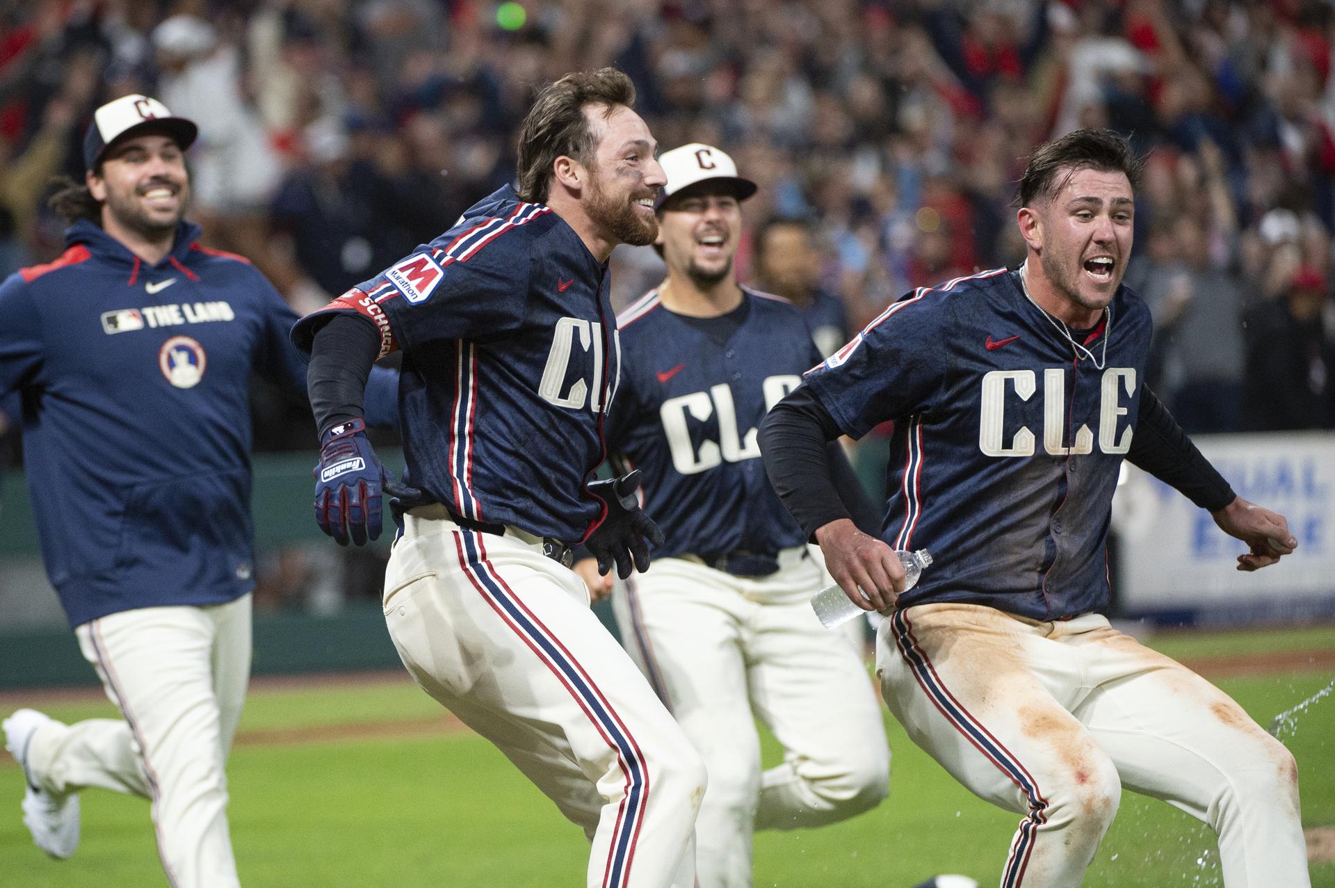 The Guardians celebrate a walk-off win on Friday