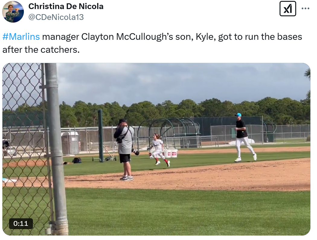 Clayton McCullough’s son, Kyle, runs the bases after the catchers do so on Friday. 