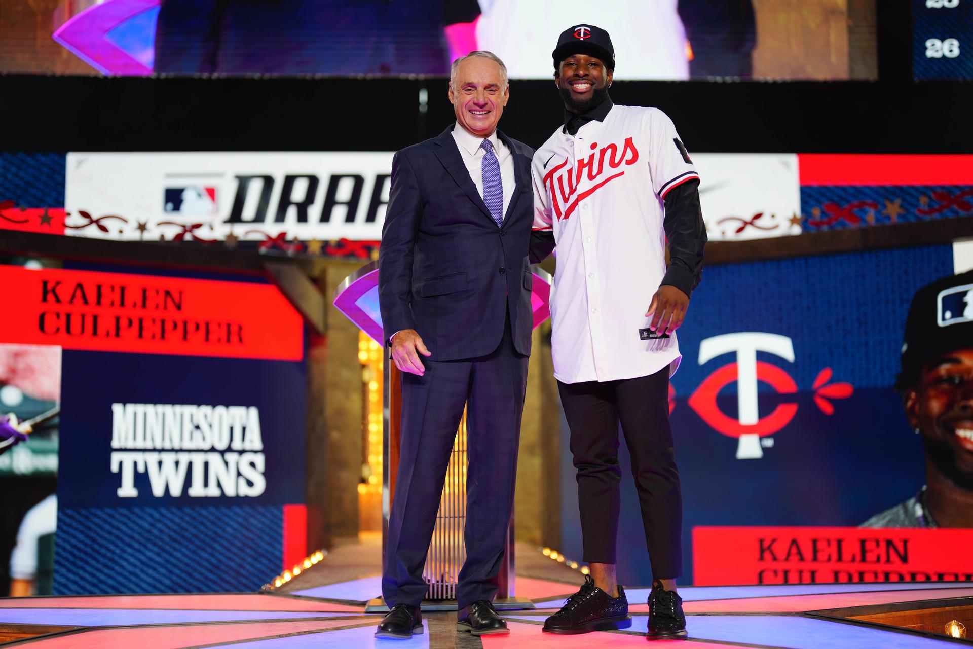 Kaelen Culpepper with Commissioner Rob Manfred on Draft day 2024