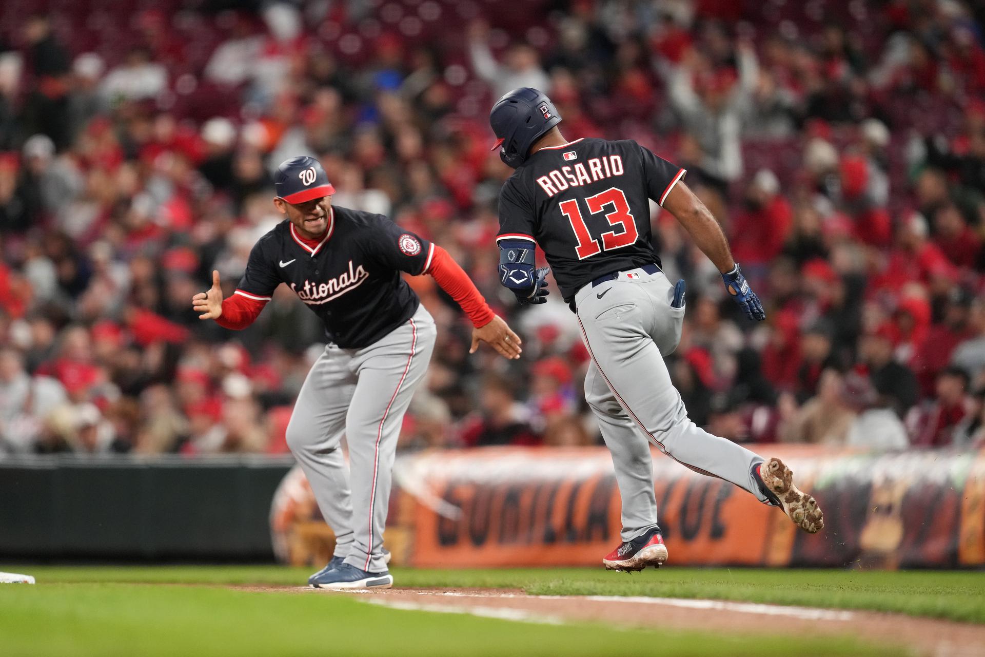 Gerardo Parra congratulates Amed Rosario