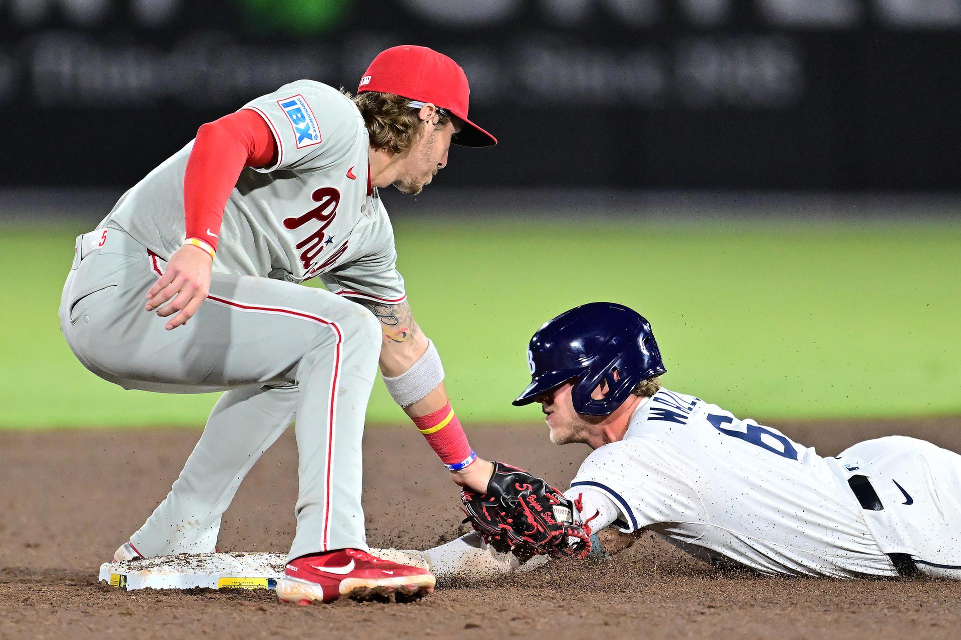 Bryson Stott tags out Taylor Walls stealing in the 9th