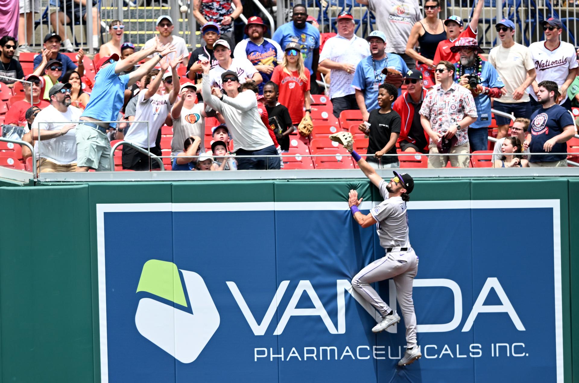 Sam Hilliard tries robbing James Wood's home run