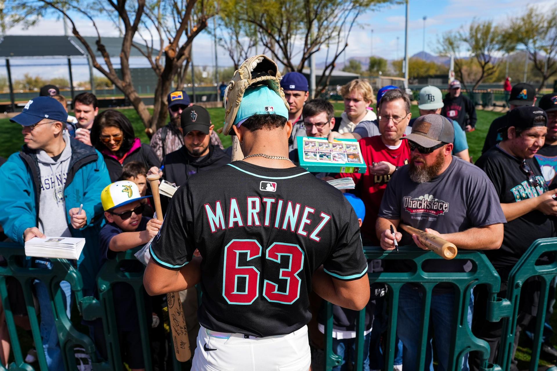 Justin Martinez signs autographs for fans