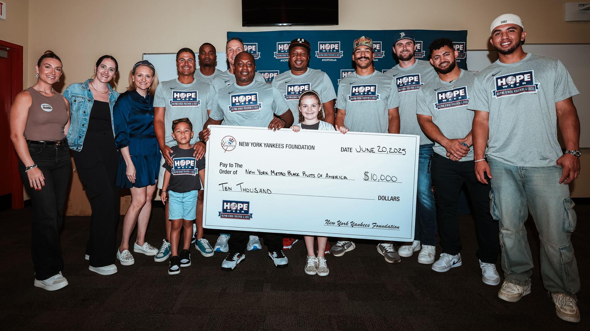 Yankees present check to NY Metro Black Pilots of America