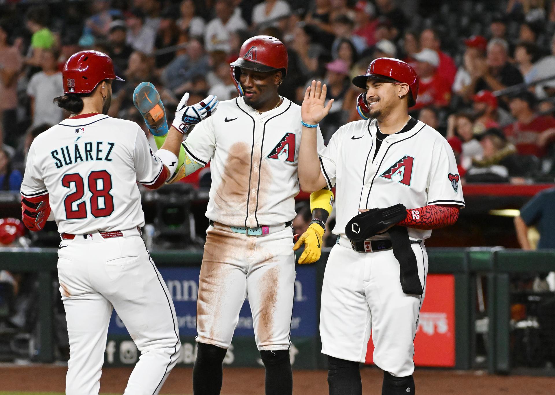 Eugenio Suárez, Geraldo Perdomo and Josh Naylor