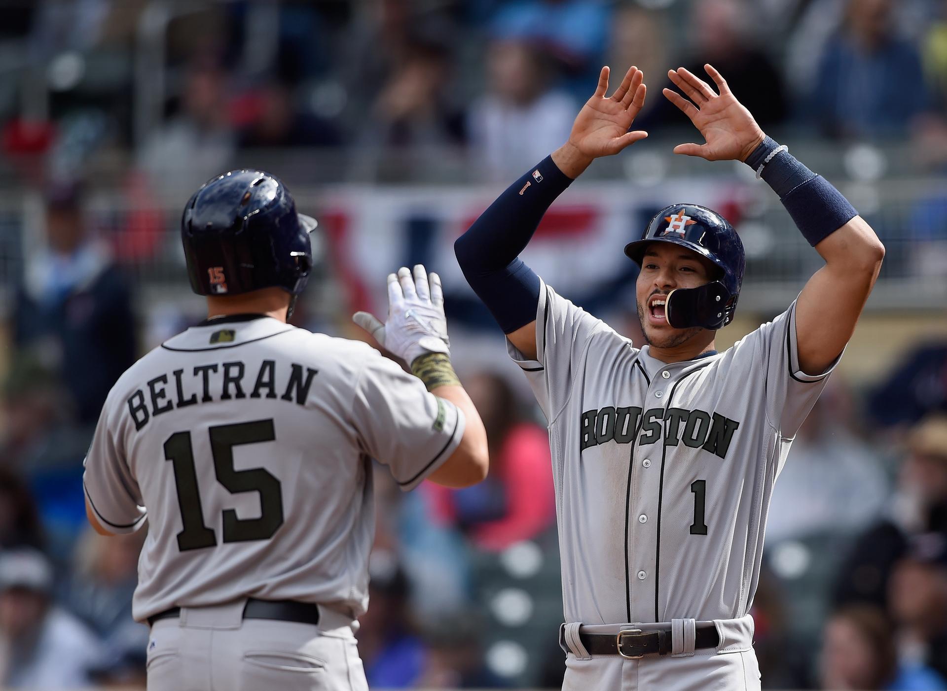 Carlos Beltrán and Carlos Correa