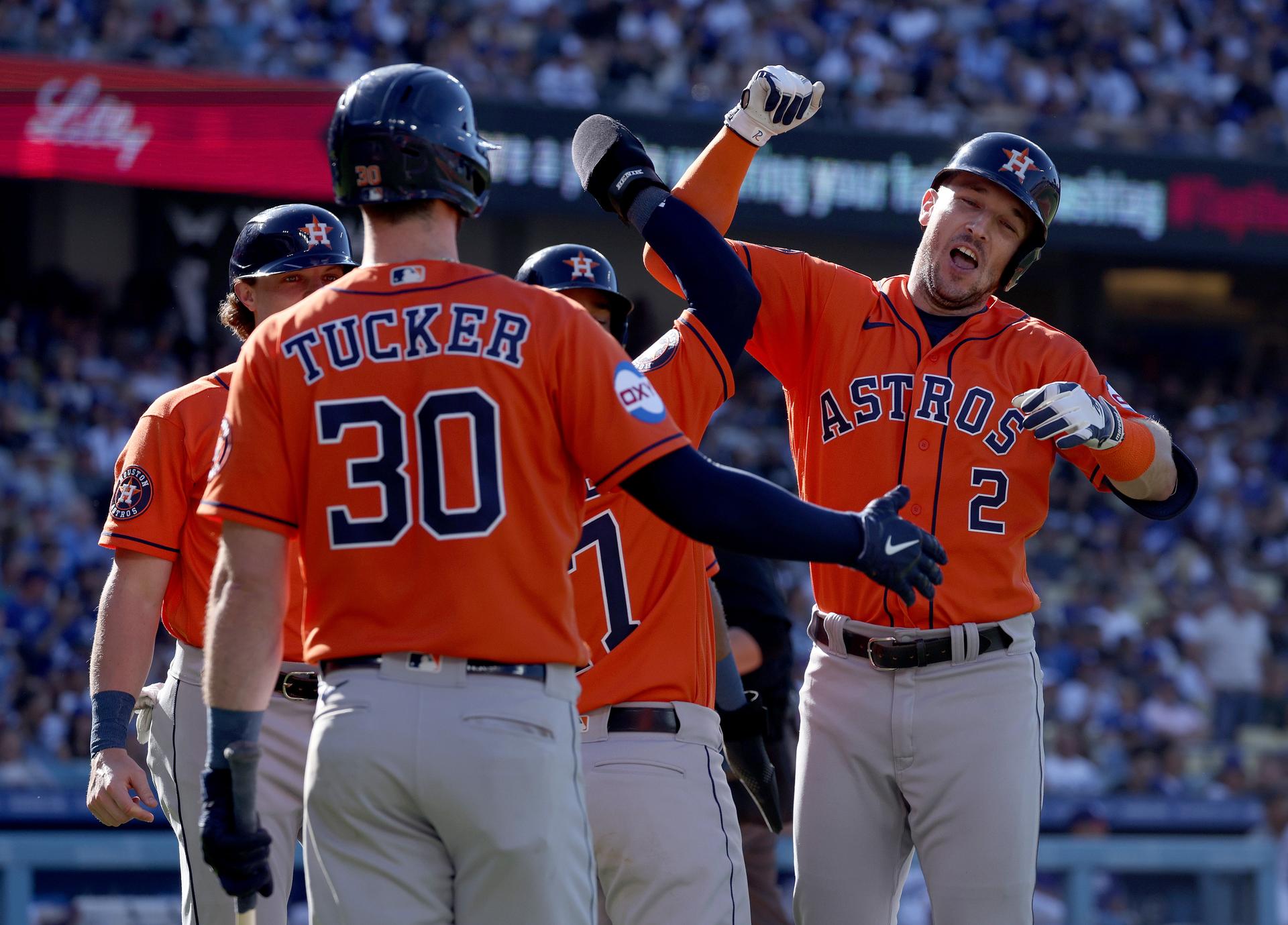 Alex Bregman celebrates with Kyle Tucker