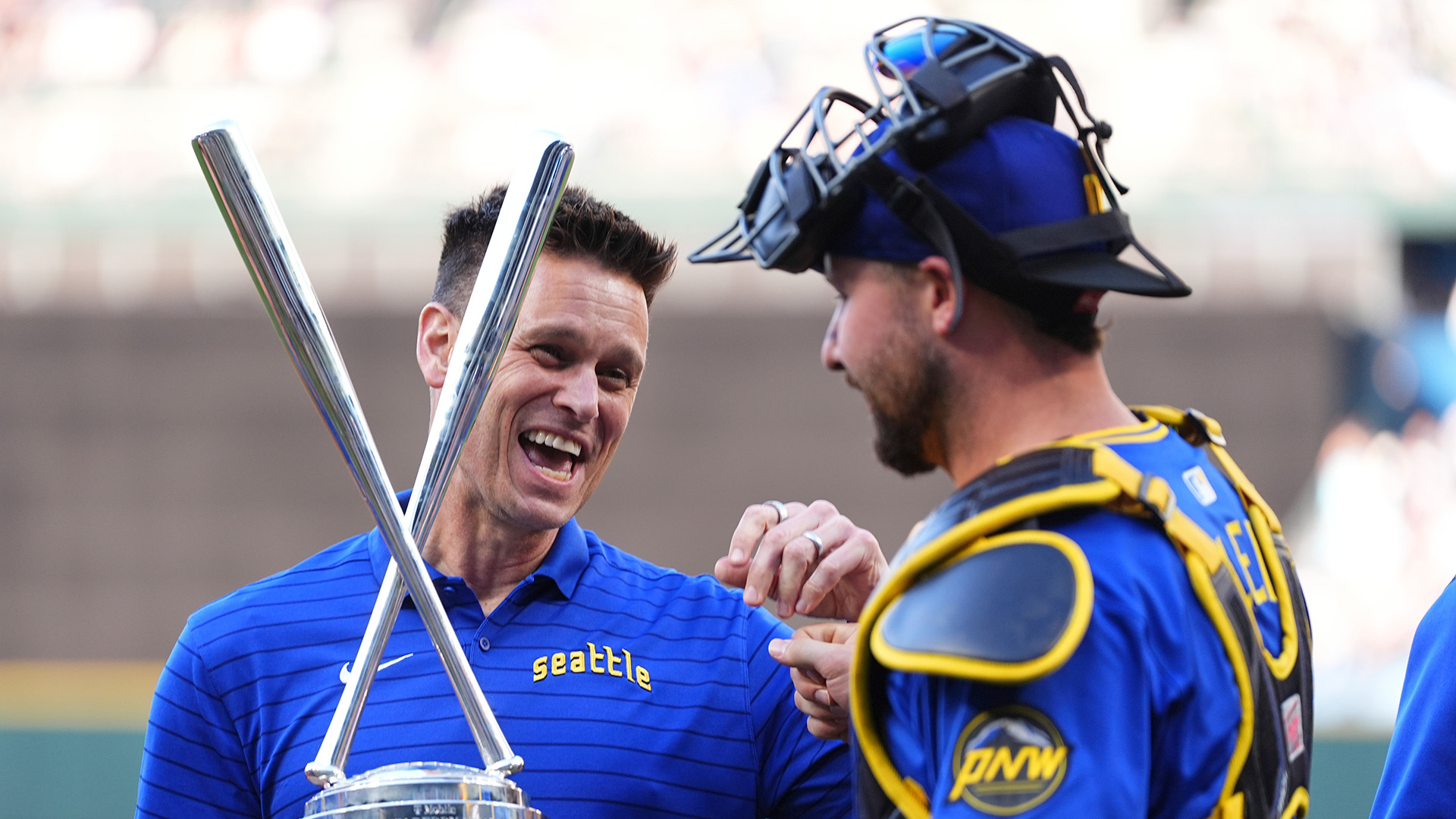 Jerry Dipoto and Cal Raleigh