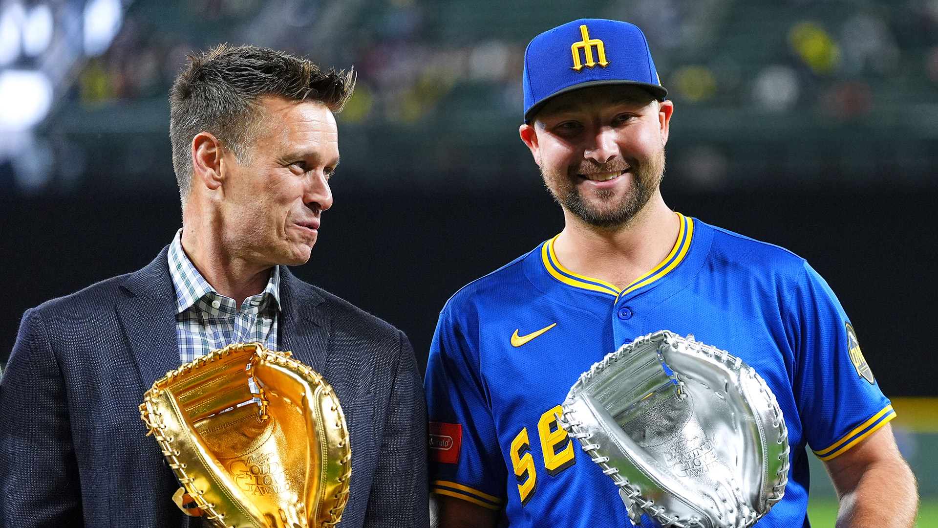 Jerry Dipoto and Cal Raleigh
