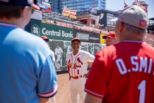 Ozzie Smith talks with campers