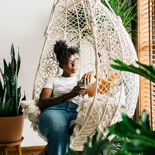 Woman enjoying the Plant Life