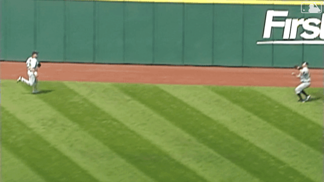 A GIF of a ball hitting a player in the head and getting caught