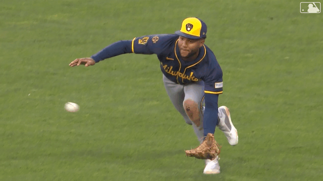 An animated gif of Brewers outfielder Jackson Chourio making a diving catch