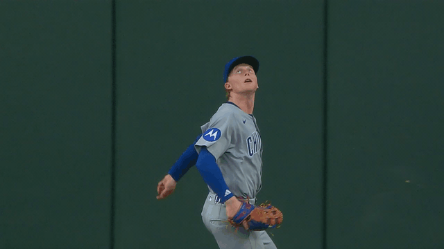 An animated gif of Cubs center fielder Pete Crow-Armstrong's leaping catch at the wall in St. Louis