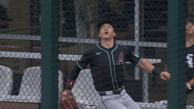 An animated gif of Jake McCarthy robbing a home run in Chicago