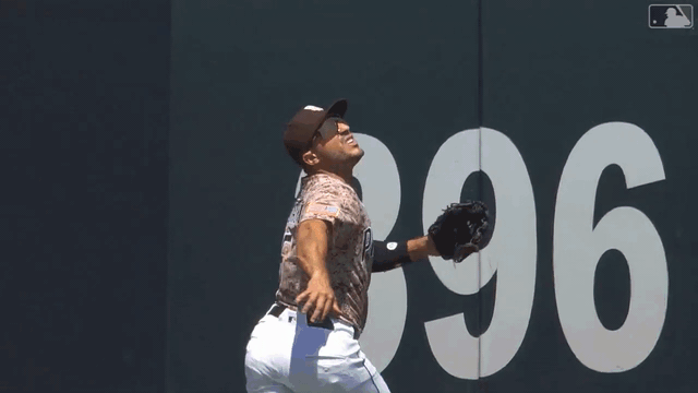 A GIF of Ramón Laureano robbing a grand slam