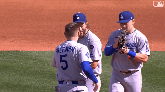 GIF of Clayton Kershaw and Freddie Freeman hugging
