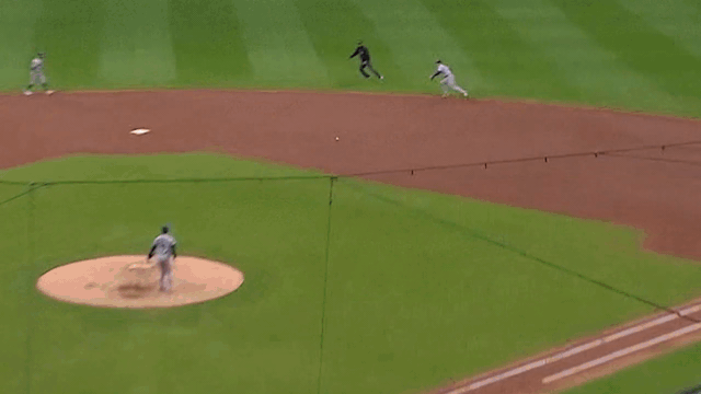 An animated gif of Tommy Edman making a sliding play in Game 2 of the NLCS