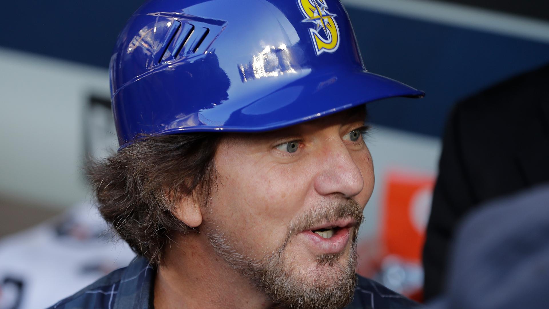 Eddie Vedder in a Mariners helmet