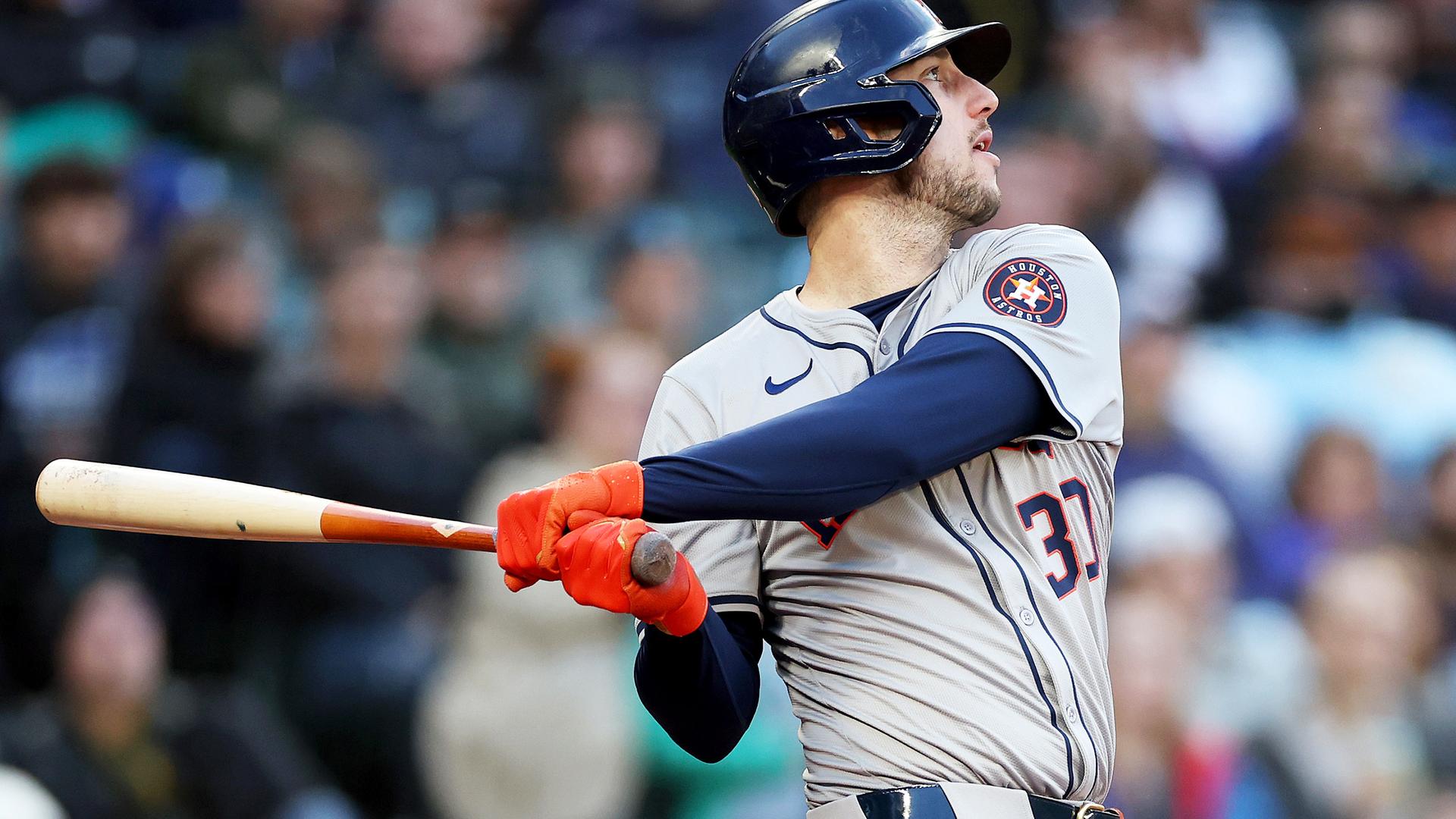 Kyle Tucker watching the ball on his swing follow through