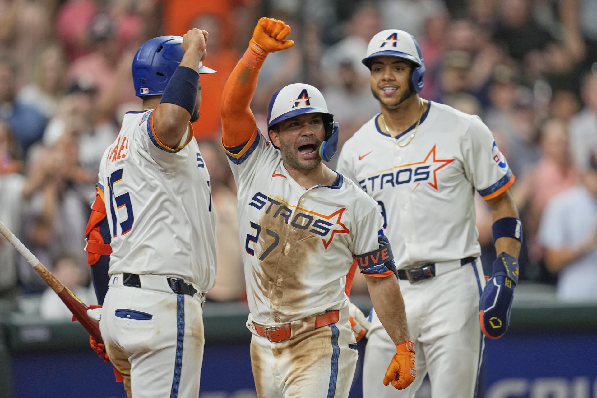 Jose Altuve celebrates his home run