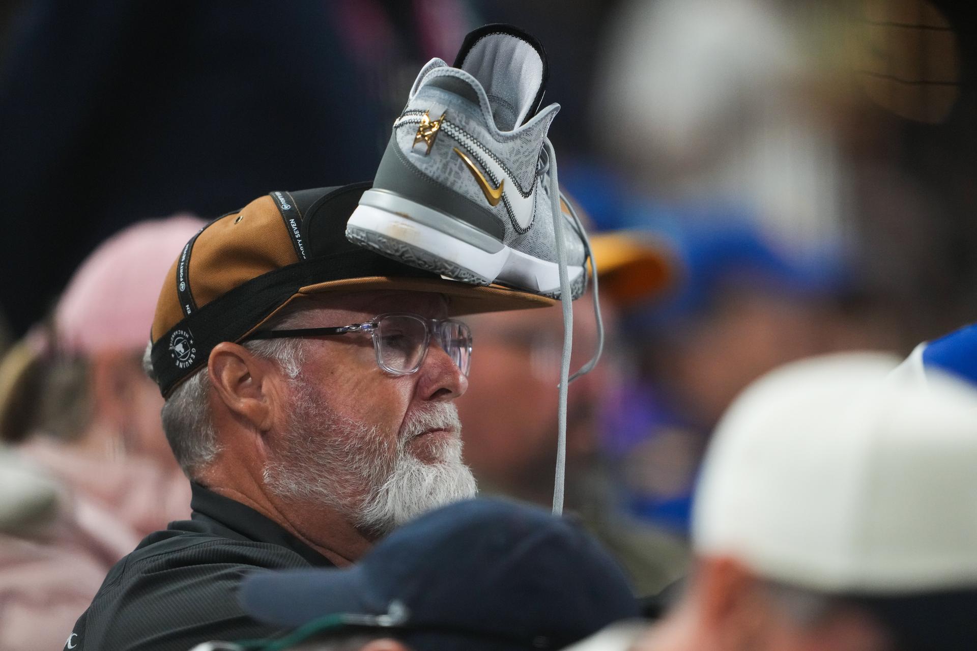 A Mariners fan dons a rally shoe