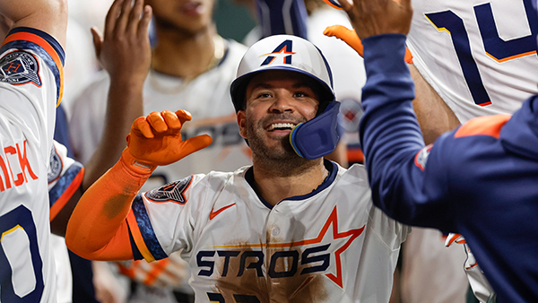 Jose Altuve celebrates with teammates